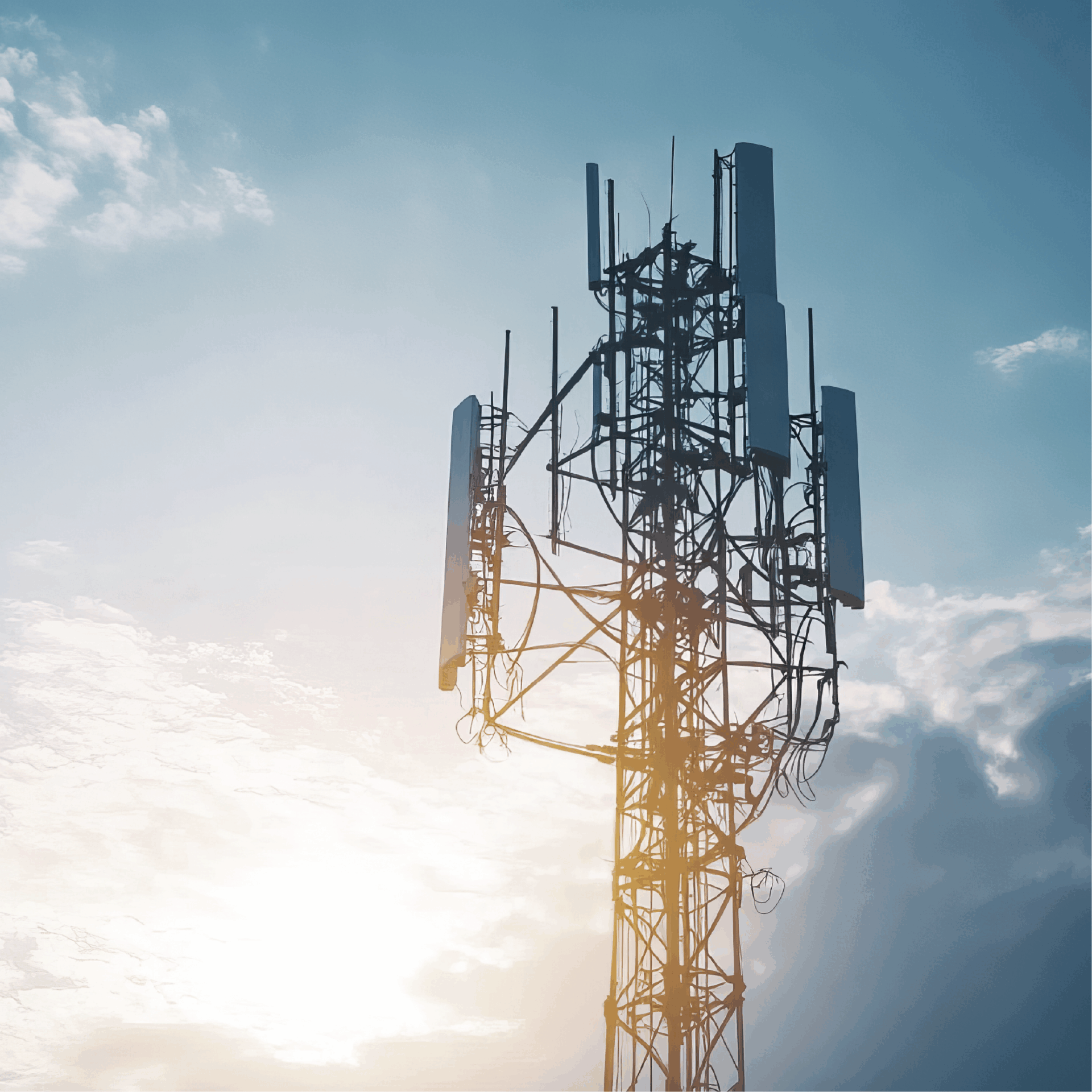 Cellular communications tower with 5G/LTE antennas.